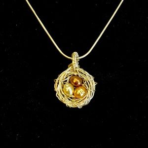 Handcrafted bird nest necklace